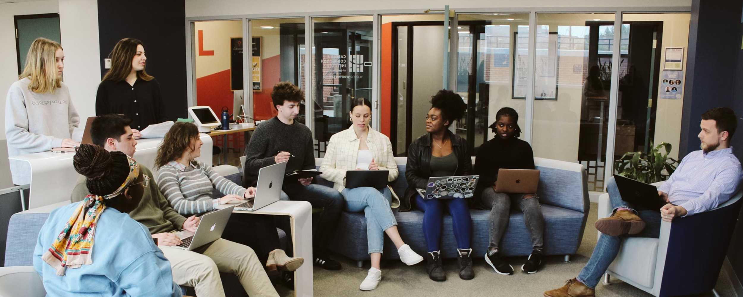 students on their laptops