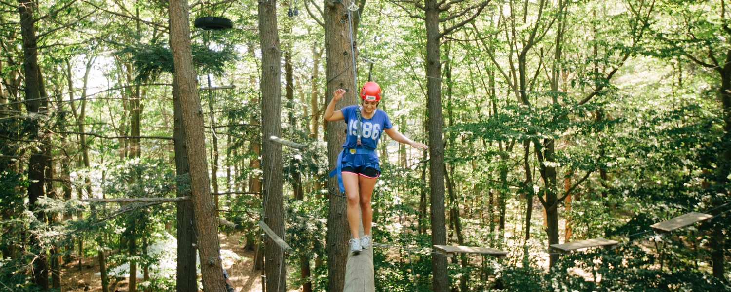 Student on high ropes