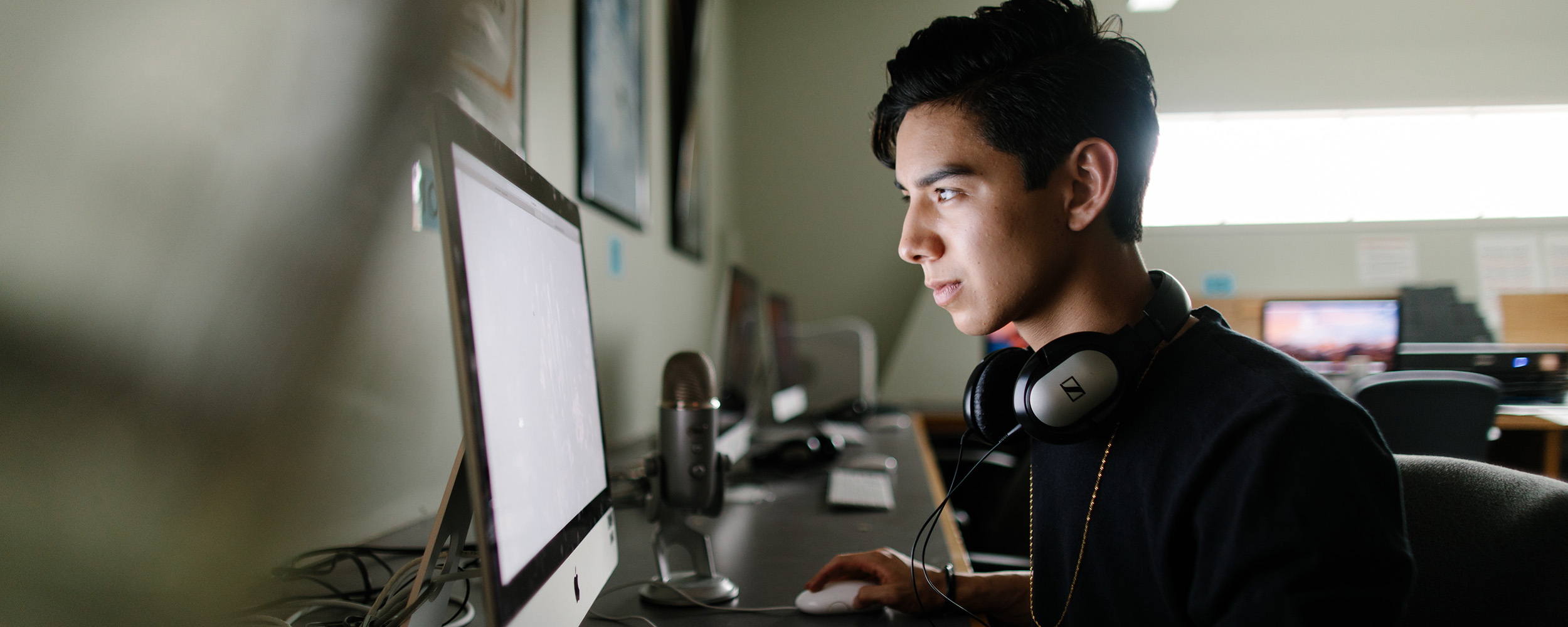 student working in video editing lab