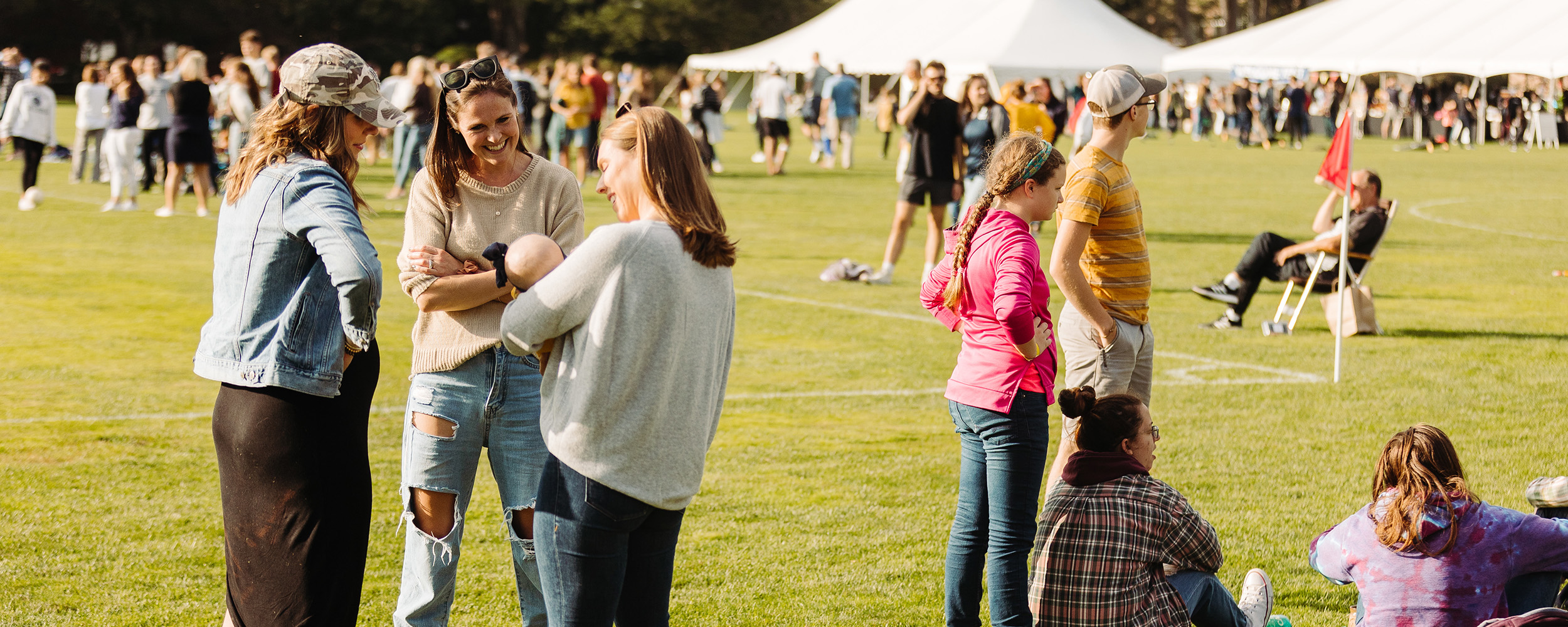 alumni chatting on the quad 