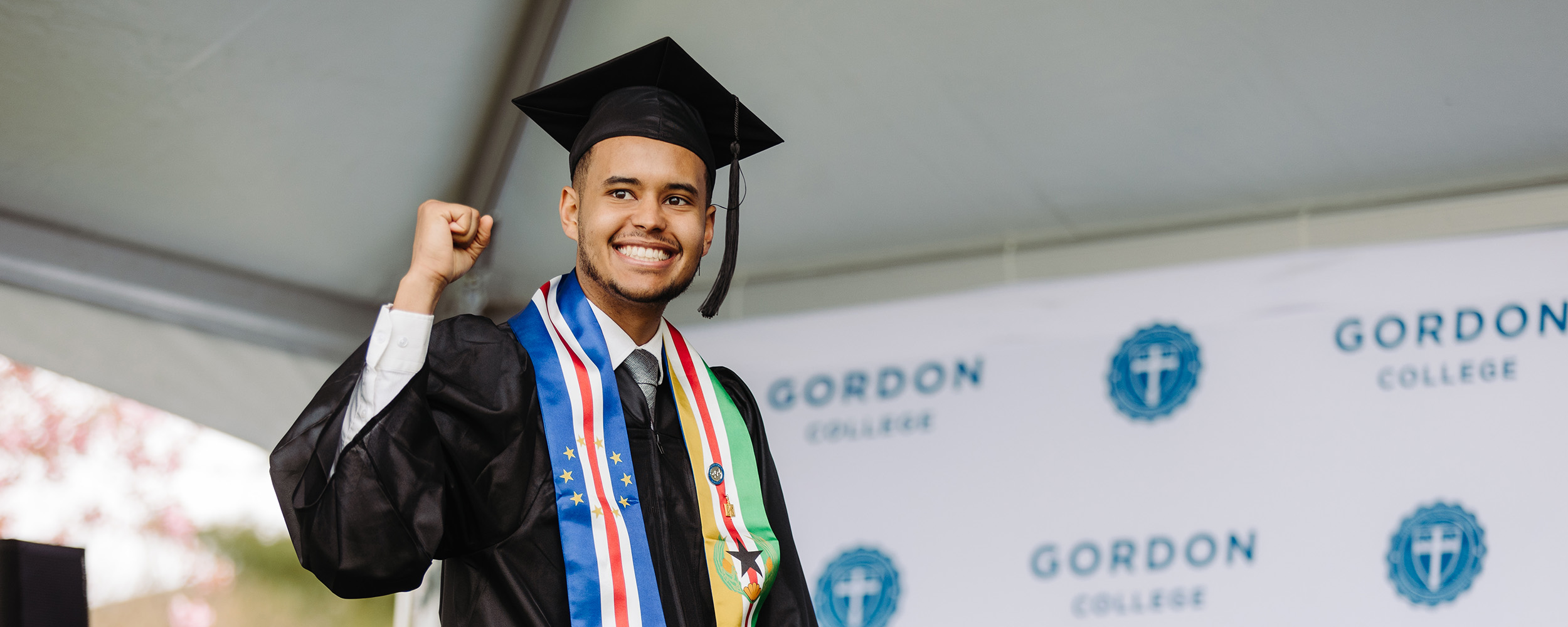 students walking to graduation