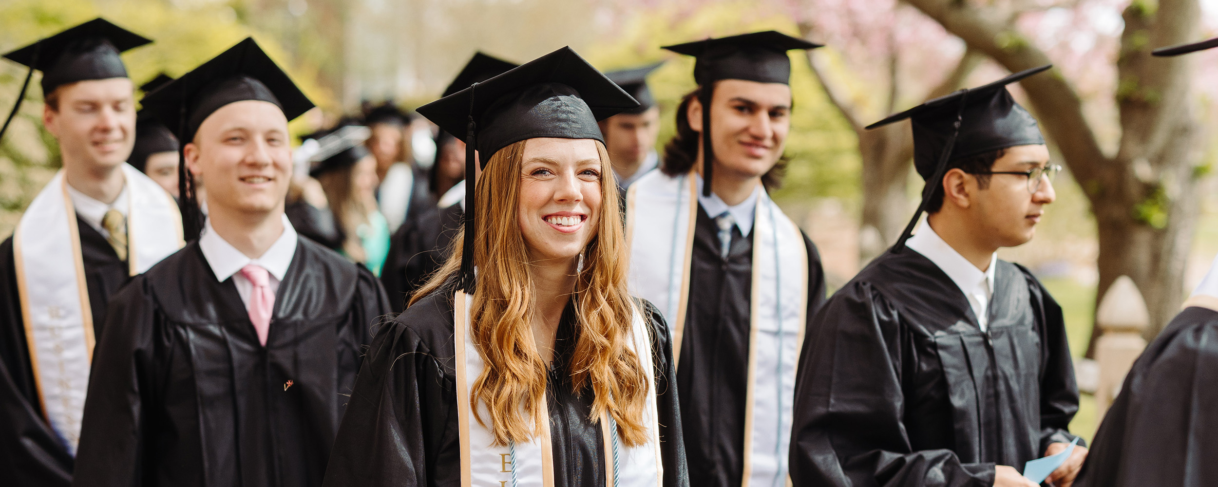 graduate students talking to one another