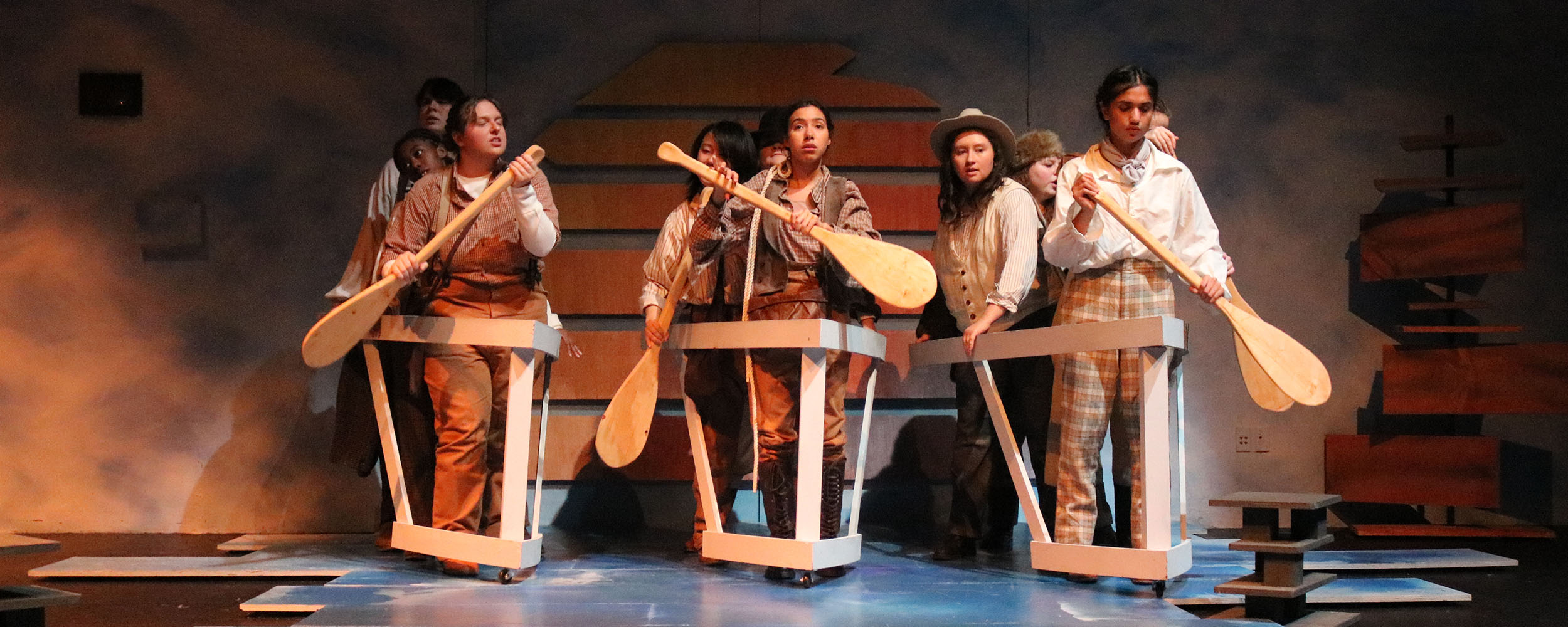 students on stage during theatre production