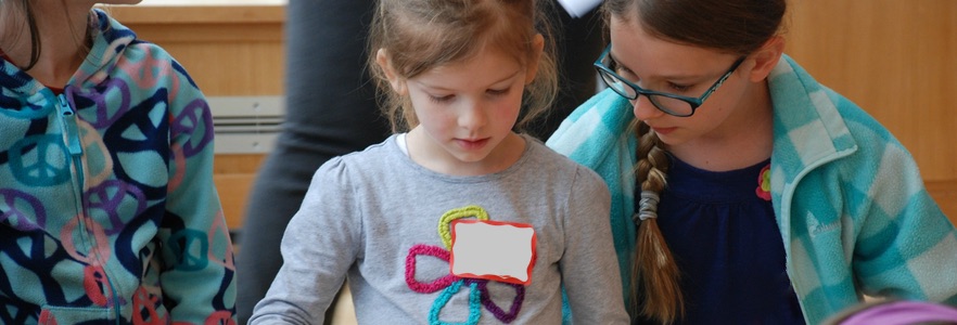 close up of girls playing instruments