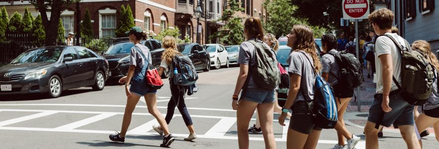 students walking across street in Boston