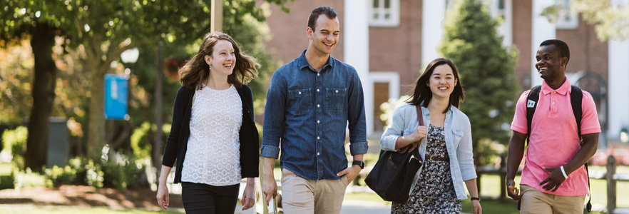 Students walking by chapel