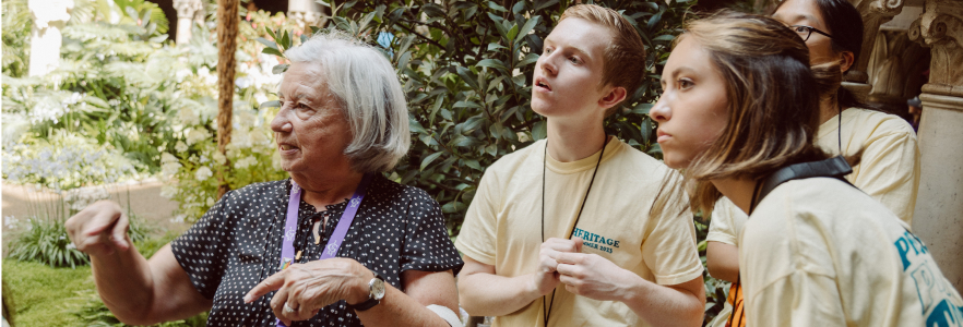 learning from guide at museum