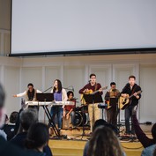 chapel band performing during college chapel gathering