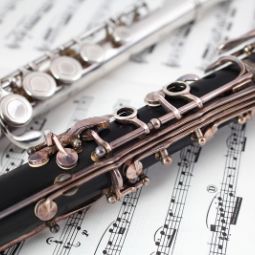 flute, clarinet and sheet music 