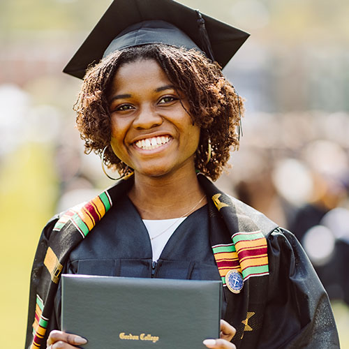 graduating student in cap and gown