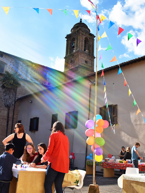 Community meal in convent courtyard