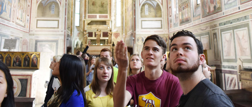 students taking in artwork in Padova