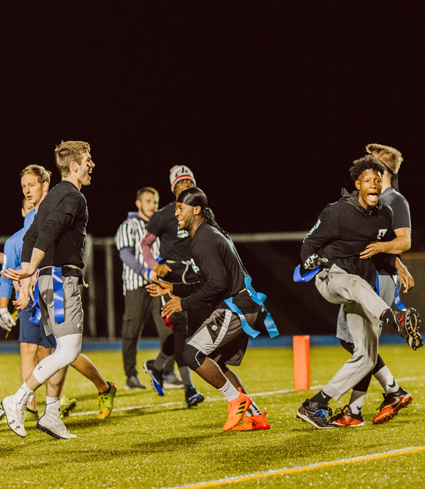 students playing flag football